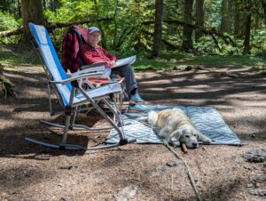 Carolyn & Penny relaxing in camp